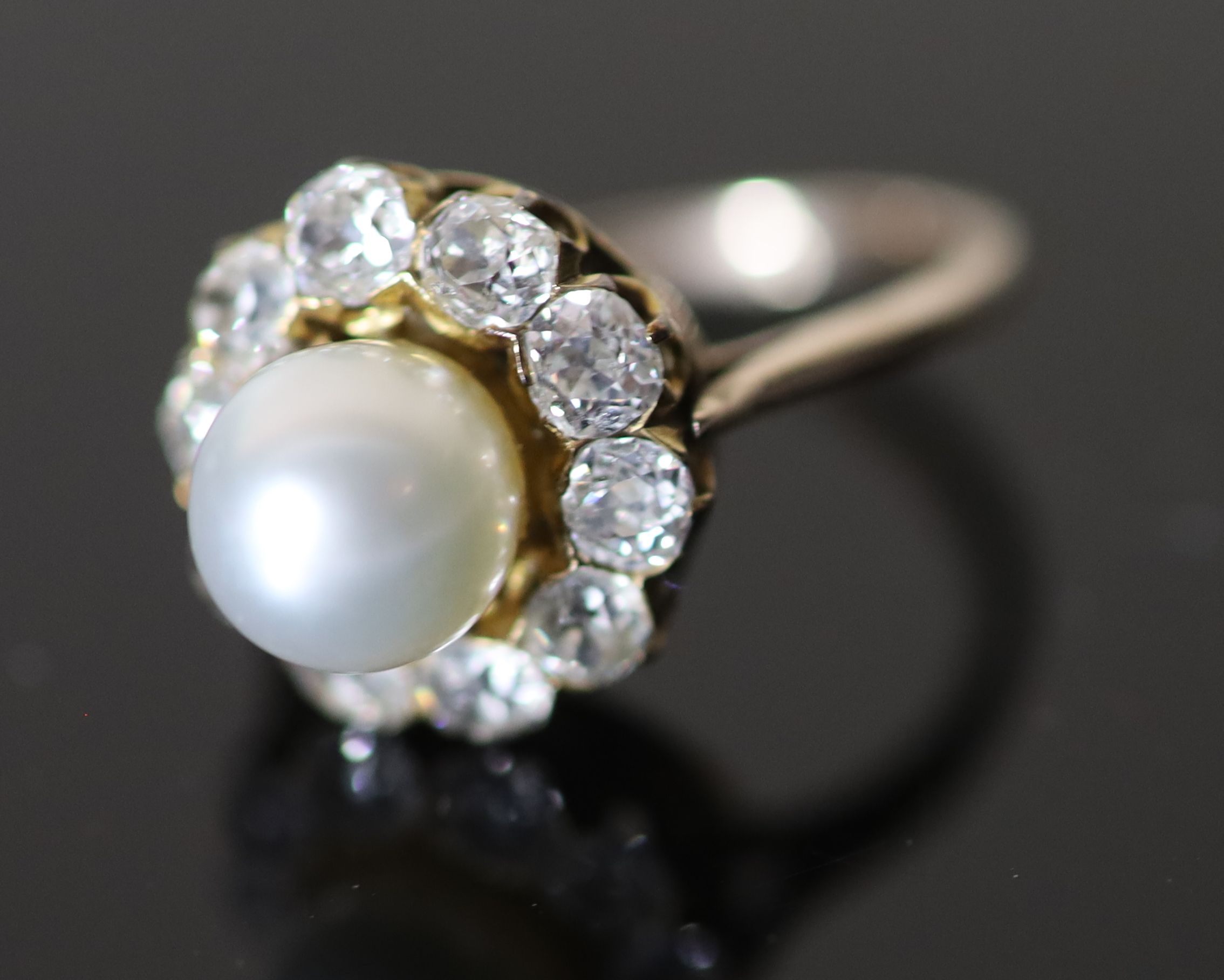 A modern gold, cultured pearl and diamond set circular cluster ring,